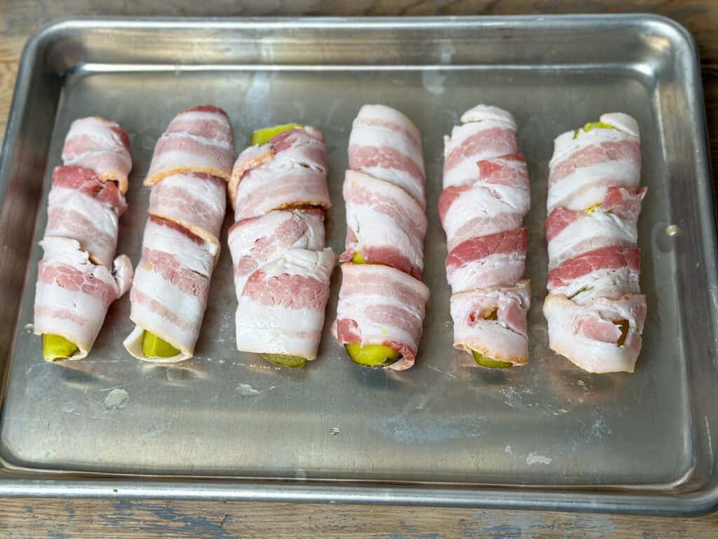 Pickles wrapped in bacon
