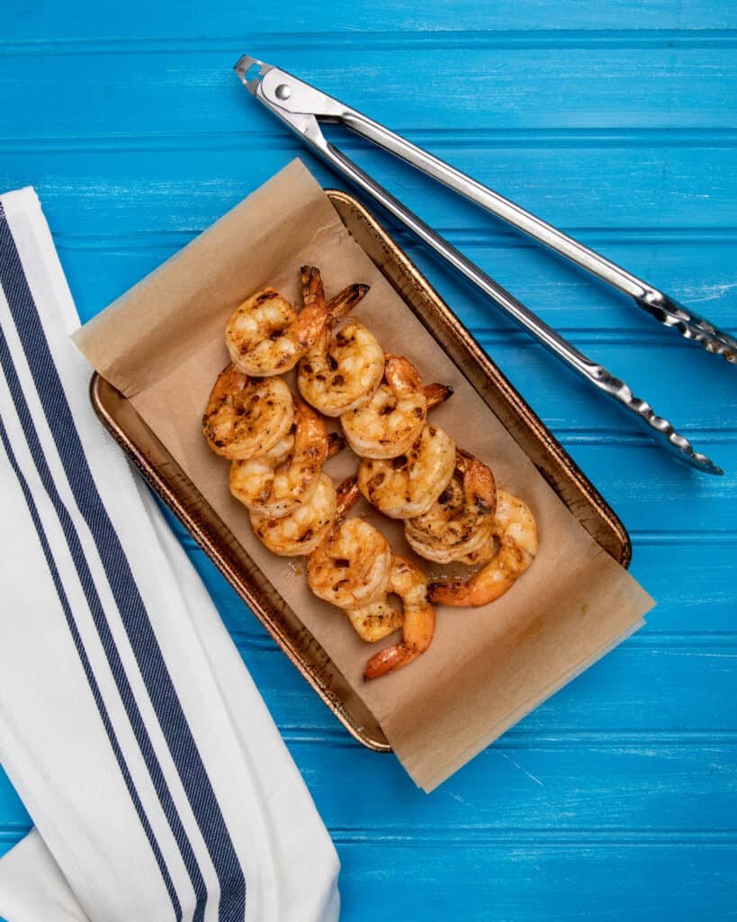 Grilled shrimp on a baking tray 
