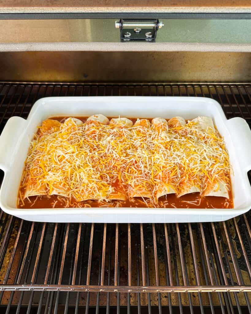 Beef enchiladas in a baking pan on the smoker