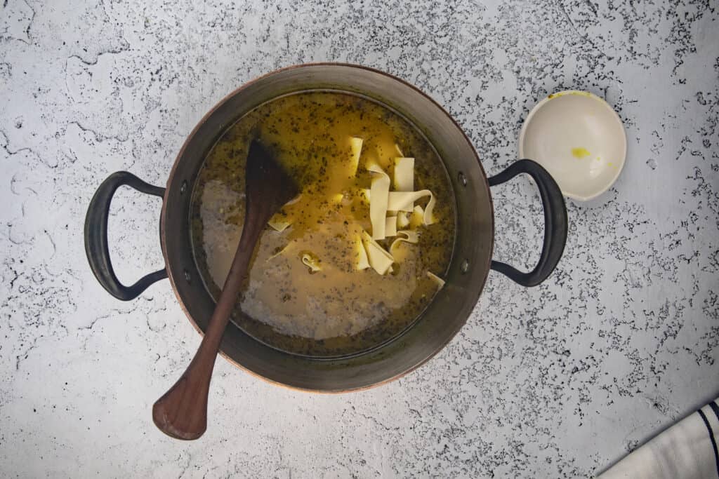 Egg noodles in chicken noodle soup