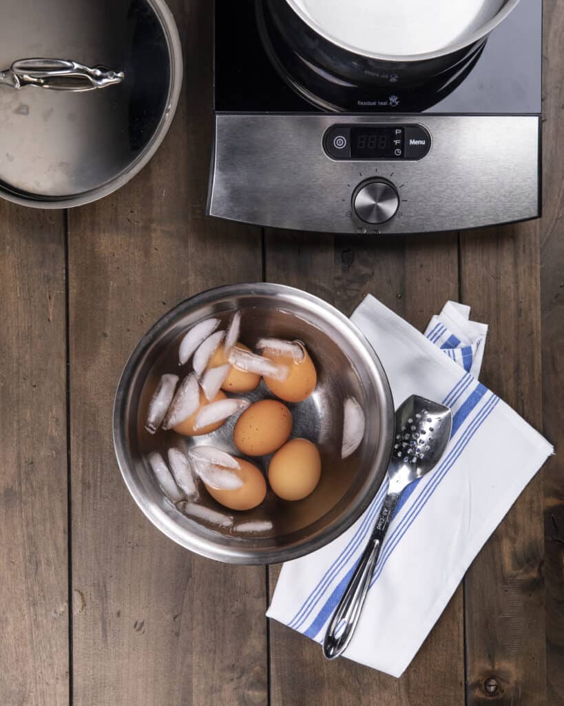 Hardboiled eggs in ice water