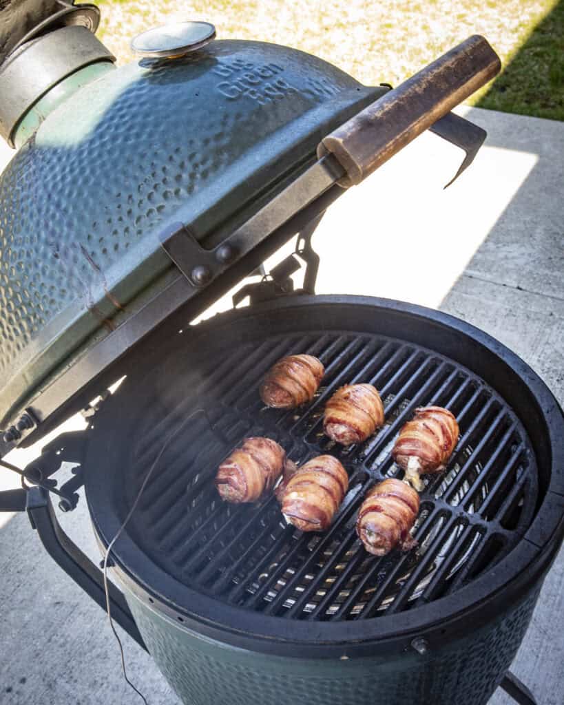 Bacon wrapped armadillo eggs on the smoker